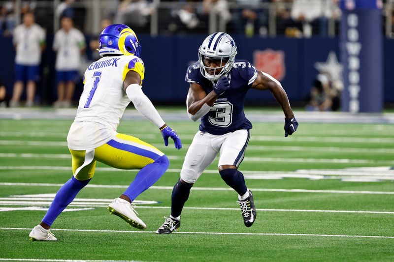 Dallas Cowboys wide receiver Brandin Cooks (3) runs a route with Los Angeles Rams cornerback Derion Kendrick (1) defending during the second half of an NFL football game in Arlington, Texas, Sunday, Oct. 29, 2023. (AP Photo/Roger Steinman)