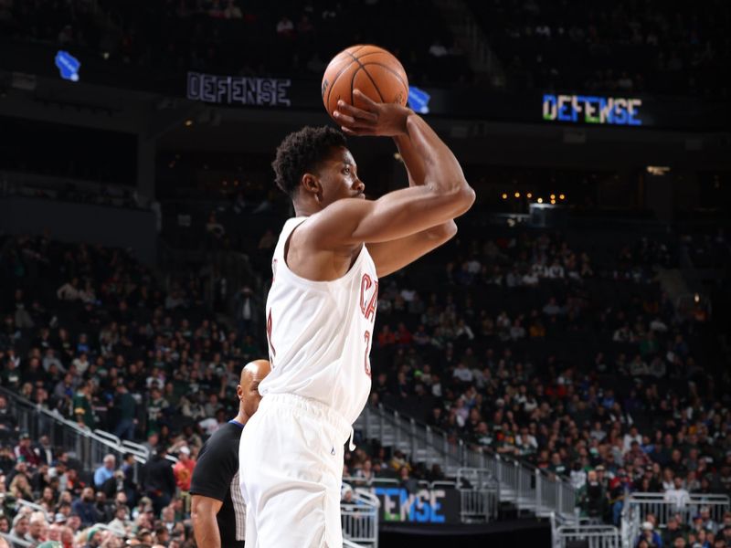 MILWAUKEE, WI - NOVEMBER 16: Mamadi Diakite #21 of the Cleveland Cavaliers shoots the ball during the game against the Milwaukee Bucks on November 16, 2022 at the Fiserv Forum Center in Milwaukee, Wisconsin. NOTE TO USER: User expressly acknowledges and agrees that, by downloading and or using this Photograph, user is consenting to the terms and conditions of the Getty Images License Agreement. Mandatory Copyright Notice: Copyright 2022 NBAE (Photo by Jeff Haynes/NBAE via Getty Images).