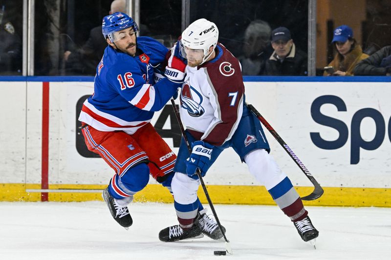 Feb 5, 2024; New York, New York, USA;  Colorado Avalanche defenseman Devon Toews (7) attempts to pass the clear the puck defended by New York Rangers center Vincent Trocheck (16)  during the first period at Madison Square Garden. Mandatory Credit: Dennis Schneidler-USA TODAY Sports