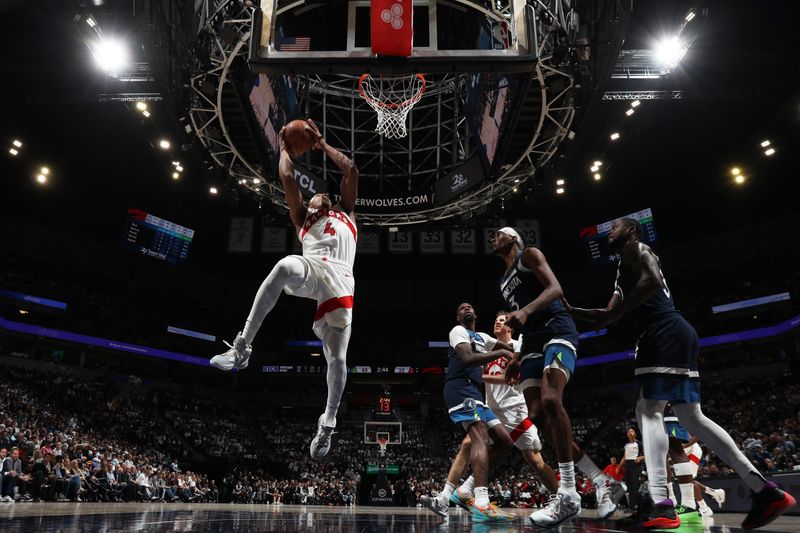 MINNEAPOLIS, MN -  OCTOBER 22: Scottie Barnes #4 of the Toronto Raptors drives to the basket during the game against the Minnesota Timberwolves on October 22, 2024 at Target Center in Minneapolis, Minnesota. NOTE TO USER: User expressly acknowledges and agrees that, by downloading and or using this Photograph, user is consenting to the terms and conditions of the Getty Images License Agreement. Mandatory Copyright Notice: Copyright 2024 NBAE (Photo by Jordan Johnson/NBAE via Getty Images)