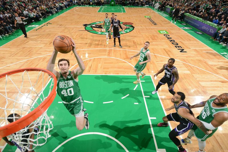 BOSTON, MA - APRIL 5: Luke Kornet #40 of the Boston Celtics dunks the ball during the game against the Sacramento Kings  on April 5, 2024 at the TD Garden in Boston, Massachusetts. NOTE TO USER: User expressly acknowledges and agrees that, by downloading and or using this photograph, User is consenting to the terms and conditions of the Getty Images License Agreement. Mandatory Copyright Notice: Copyright 2024 NBAE  (Photo by Brian Babineau/NBAE via Getty Images)