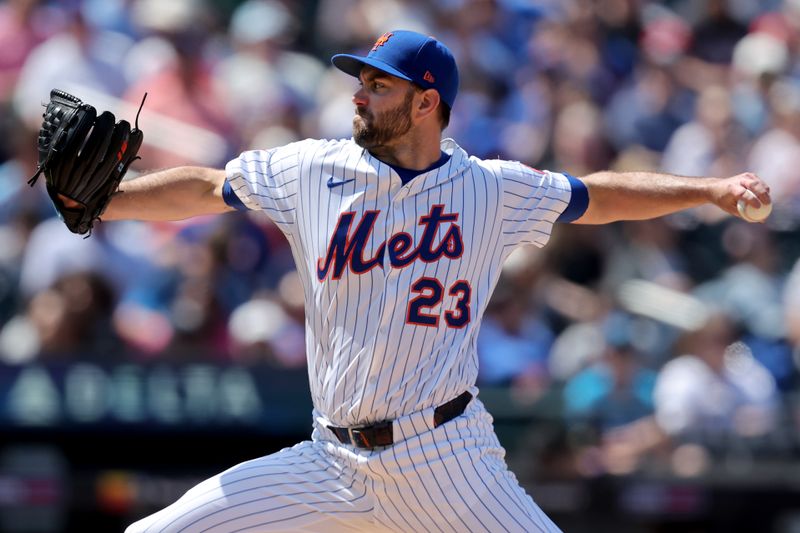 Apr 23, 2025; New York City, New York, USA; New York Mets starting pitcher David Peterson (23) pitches against the Philadelphia Phillies during the fourth inning at Citi Field. Mandatory Credit: Brad Penner-Imagn Images