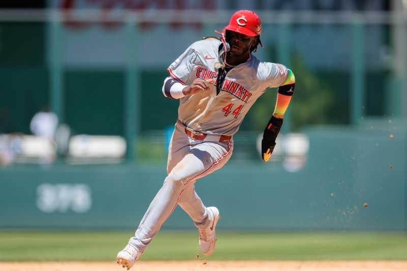Jun 5, 2024; Denver, Colorado, USA; Cincinnati Reds shortstop Elly De La Cruz (44) runs to third during the fifth inning against the Colorado Rockies at Coors Field. Mandatory Credit: Andrew Wevers-USA TODAY Sports