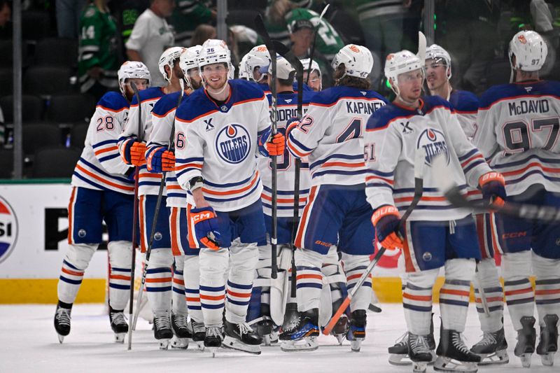 May 23, 2025; Dallas, Texas, USA; Edmonton Oilers defenseman John Klingberg (36) and teammates react after defeating the Dallas Stars in game two of the Western Conference Final of the 2025 Stanley Cup Playoffs at American Airlines Center. Mandatory Credit: Jerome Miron-Imagn Images