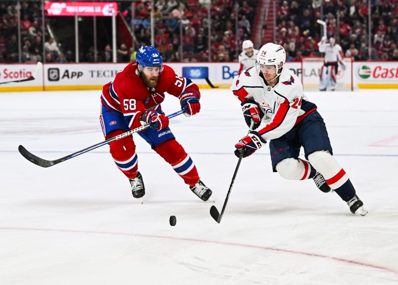 Oct 21, 2023; Montreal, Quebec, CAN; Montreal Canadiens defenseman David Savard (58) defends against Washington Capitals center Connor McMichael (24) during the third period at Bell Centre. Mandatory Credit: David Kirouac-USA TODAY Sports