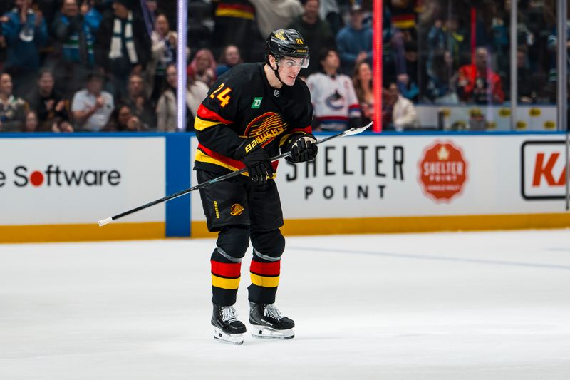 Jan 23, 2026; Vancouver, British Columbia, CAN; Vancouver Canucks defenseman Zeev Buium (24) celebrates his goal against the New Jersey Devils in the second period at Rogers Arena. Mandatory Credit: Bob Frid-Imagn Images