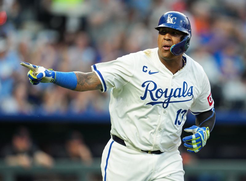 May 20, 2024; Kansas City, Missouri, USA; Kansas City Royals designated hitter Salvador Perez (13) gestures to the dugout after hitting a home run during the sixth inning against the Detroit Tigers at Kauffman Stadium. Mandatory Credit: Jay Biggerstaff-USA TODAY Sports