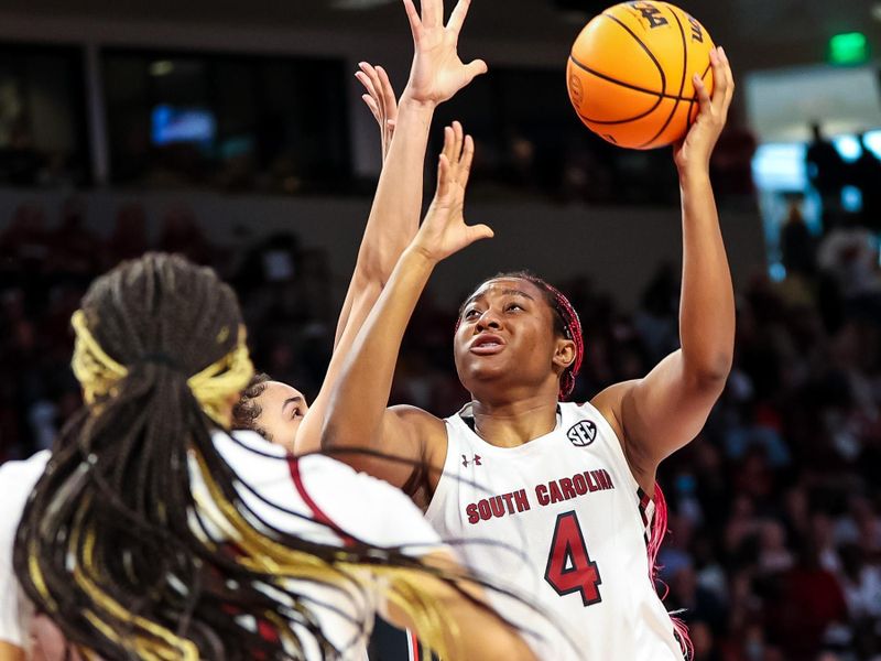 Feb 26, 2023; Columbia, South Carolina, USA; South Carolina Gamecocks forward Aliyah Boston (4) shoots against the Georgia Lady Bulldogs in the first half at Colonial Life Arena. Mandatory Credit: Jeff Blake-USA TODAY Sports