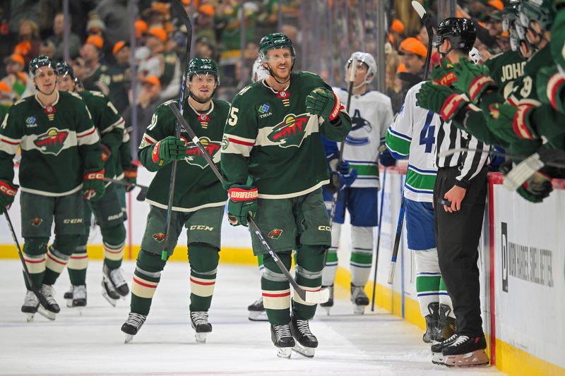 Nov 1, 2025; Saint Paul, Minnesota, USA;  Minnesota Wild defensemen Jonas Brodin (25) celebrates his goal against the Vancouver Canucks during the third period at Grand Casino Arena. Mandatory Credit: Nick Wosika-Imagn Images