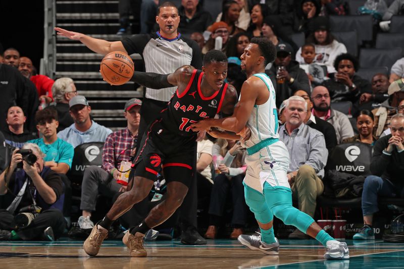 CHARLOTTE, NC - JANUARY 1: Dennis Schroder #17 of the Toronto Raptors handles the ball during the game against the Charlotte Hornets on January 1, 2024 at Spectrum Center in Charlotte, North Carolina. NOTE TO USER: User expressly acknowledges and agrees that, by downloading and or using this photograph, User is consenting to the terms and conditions of the Getty Images License Agreement. Mandatory Copyright Notice: Copyright 2024 NBAE (Photo by Kent Smith/NBAE via Getty Images)