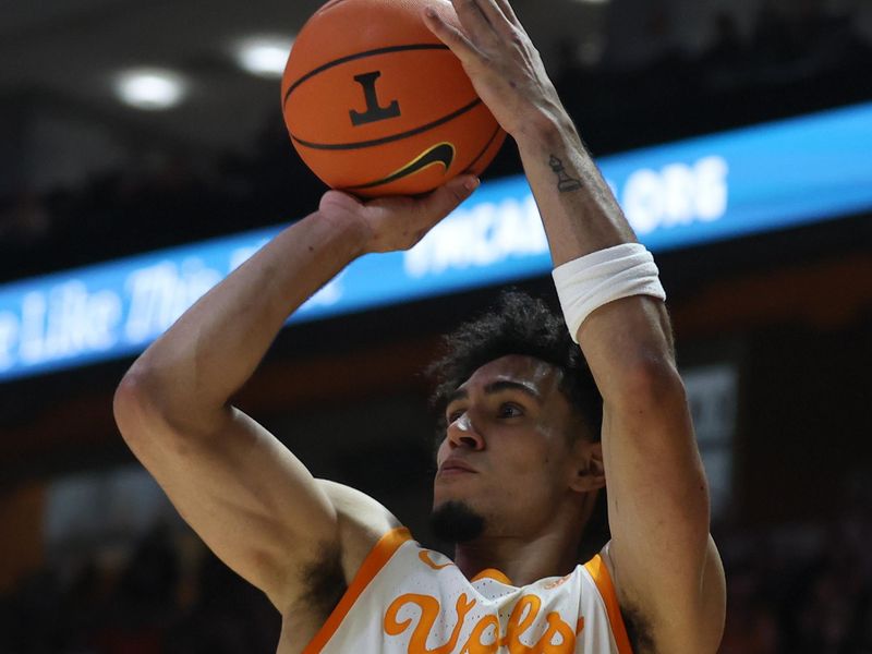 Jan 13, 2026; Knoxville, Tennessee, USA;  Tennessee Volunteers guard Bishop Boswell (3) shoots against the Texas A&M Aggies during the first half at Thompson-Boling Arena at Food City Center. Mandatory Credit: Randy Sartin-Imagn Images