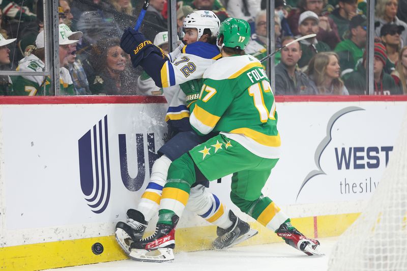 Mar 23, 2024; Saint Paul, Minnesota, USA; Minnesota Wild left wing Marcus Foligno (17) checks St. Louis Blues defenseman Justin Faulk (72) during the first period at Xcel Energy Center. Mandatory Credit: Matt Krohn-USA TODAY Sports