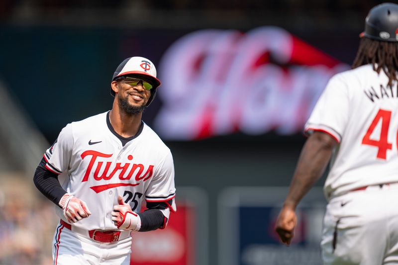 Jul 21, 2024; Minneapolis, Minnesota, USA; Minnesota Twins center field Byron Buxton (25) hits a home run in the eighth ninth inning against Milwaukee Brewers at Target Field. Mandatory Credit: Matt Blewett-USA TODAY Sports