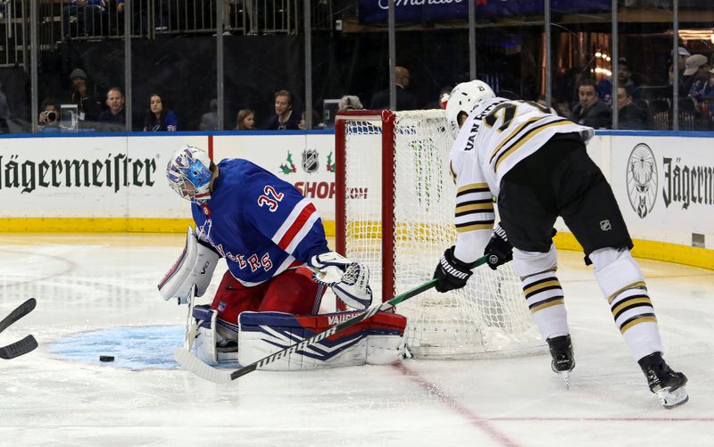 Nov 25, 2023; New York, New York, USA; New York Rangers goalie Jonathan Quick (32) makes a save on Boston Bruins left wing James van Riemsdyk (21) during the third period at Madison Square Garden. Mandatory Credit: Danny Wild-USA TODAY Sports