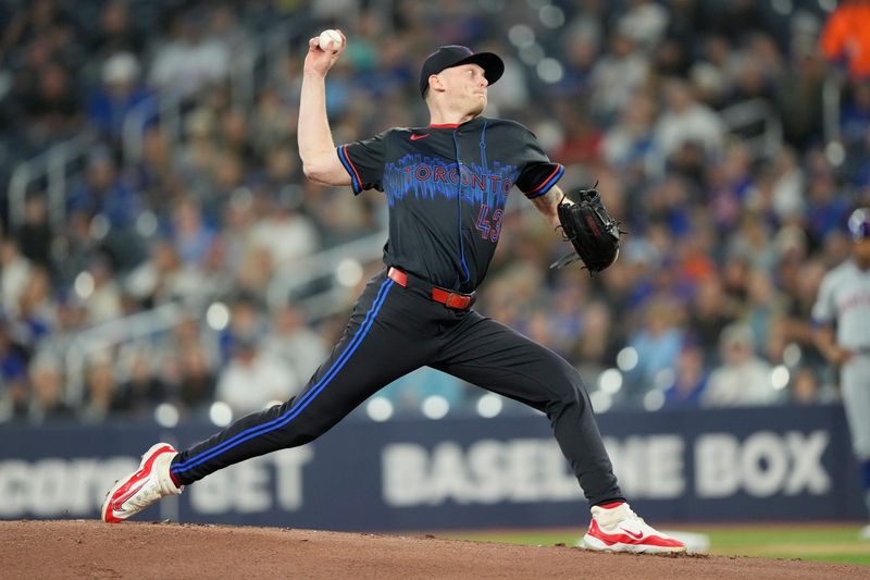 Sep 9, 2024; Toronto, Ontario, CAN; Toronto Blue Jays starting pitcher Ryan Burr (43) pitches to the New York Mets during the first inning at Rogers Centre. Mandatory Credit: John E. Sokolowski-Imagn Images