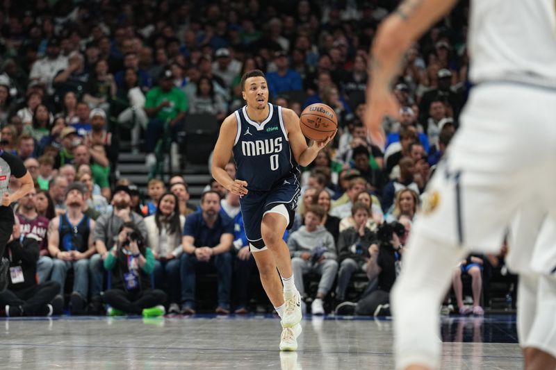 DALLAS, TX - MARCH 17: Dante Exum #0 of the Dallas Mavericks handles the ball during the game against the Denver Nuggets on March 17, 2024 at the American Airlines Center in Dallas, Texas. NOTE TO USER: User expressly acknowledges and agrees that, by downloading and or using this photograph, User is consenting to the terms and conditions of the Getty Images License Agreement. Mandatory Copyright Notice: Copyright 2024 NBAE (Photo by Glenn James/NBAE via Getty Images)