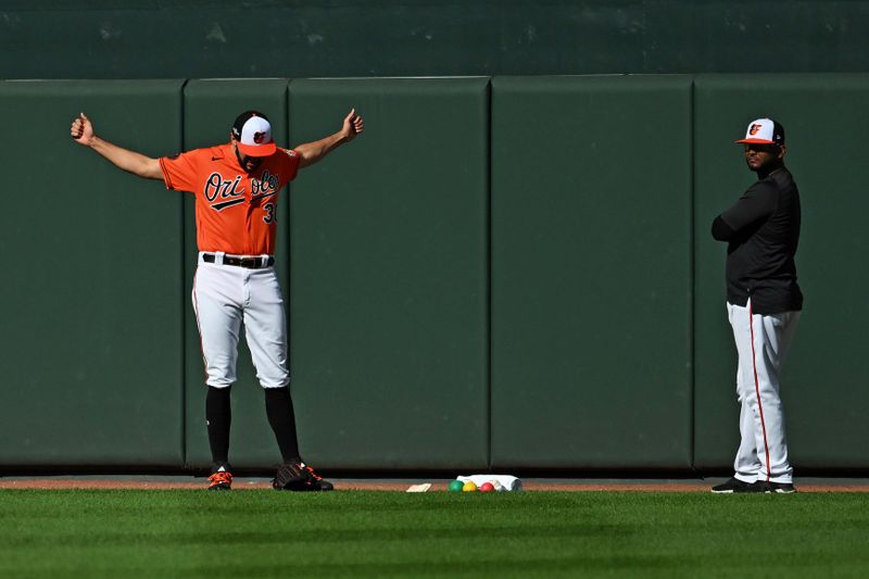 Oct 8, 2023; Baltimore, Maryland, USA; Baltimore Orioles starting pitcher Grayson Rodriguez (30) warms up for playing against the Texas Rangers during game two of the ALDS for the 2023 MLB playoffs at Oriole Park at Camden Yards. Mandatory Credit: Tommy Gilligan-USA TODAY Sports