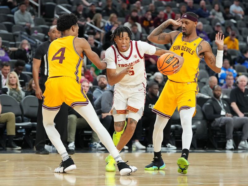 Mar 9, 2023; Las Vegas, NV, USA; USC Trojans guard Boogie Ellis (5) dribbles between Arizona State Sun Devils guard Desmond Cambridge Jr. (4) and Arizona State Sun Devils guard Luther Muhammad (1) during the second half at T-Mobile Arena. Mandatory Credit: Stephen R. Sylvanie-USA TODAY Sports