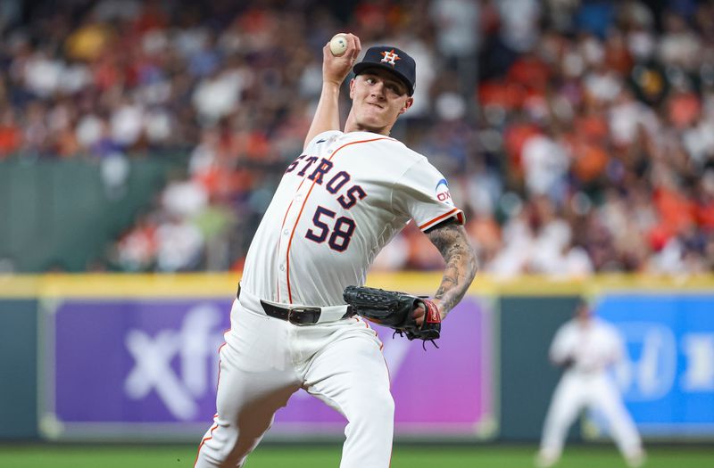 Jul 30, 2024; Houston, Texas, USA; Houston Astros starting pitcher Hunter Brown (58) delivers a pitch during the third inning against the Pittsburgh Pirates at Minute Maid Park. Mandatory Credit: Troy Taormina-USA TODAY Sports