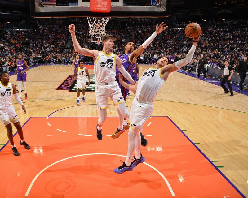 PHOENIX, AZ - JANUARY 11: Walker Kessler #24 of the Utah Jazz rebounds during the game against the Phoenix Suns on January 11, 2025 at Footprint Center in Phoenix, Arizona. NOTE TO USER: User expressly acknowledges and agrees that, by downloading and or using this photograph, user is consenting to the terms and conditions of the Getty Images License Agreement. Mandatory Copyright Notice: Copyright 2025 NBAE (Photo by Barry Gossage/NBAE via Getty Images)
