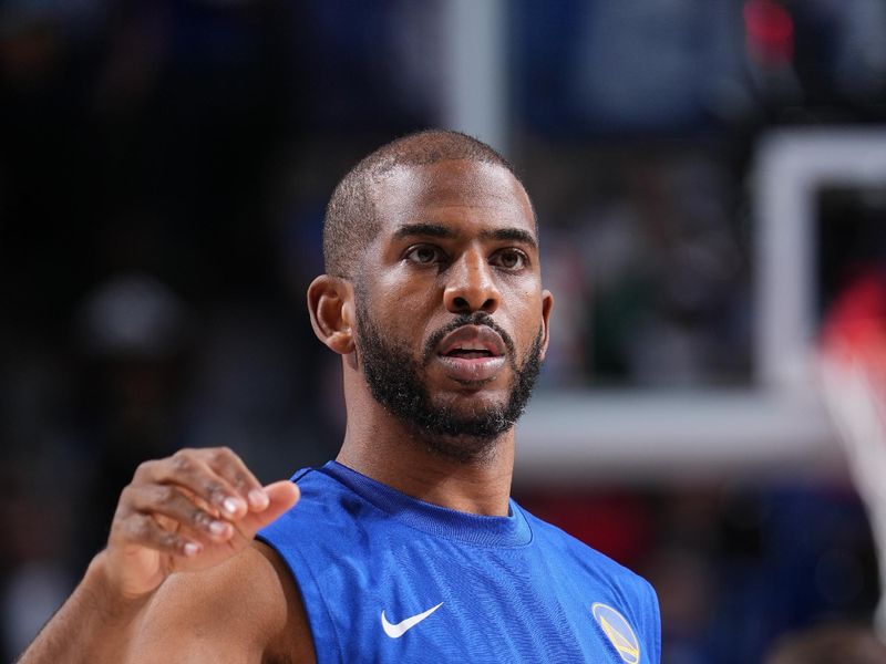 DALLAS, TX - MARCH 13: Chris Paul #3 of the Golden State Warriors warms up before the game against the Dallas Mavericks on March 13, 2024 at the American Airlines Center in Dallas, Texas. NOTE TO USER: User expressly acknowledges and agrees that, by downloading and or using this photograph, User is consenting to the terms and conditions of the Getty Images License Agreement. Mandatory Copyright Notice: Copyright 2024 NBAE (Photo by Glenn James/NBAE via Getty Images)