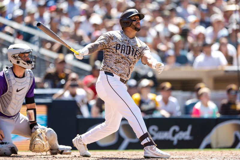 Aug 4, 2024; San Diego, California, USA; San Diego Padres right fielder David Peralta (24) hits a three run home run during the sixth inning against the Colorado Rockies at Petco Park. Mandatory Credit: David Frerker-USA TODAY Sports