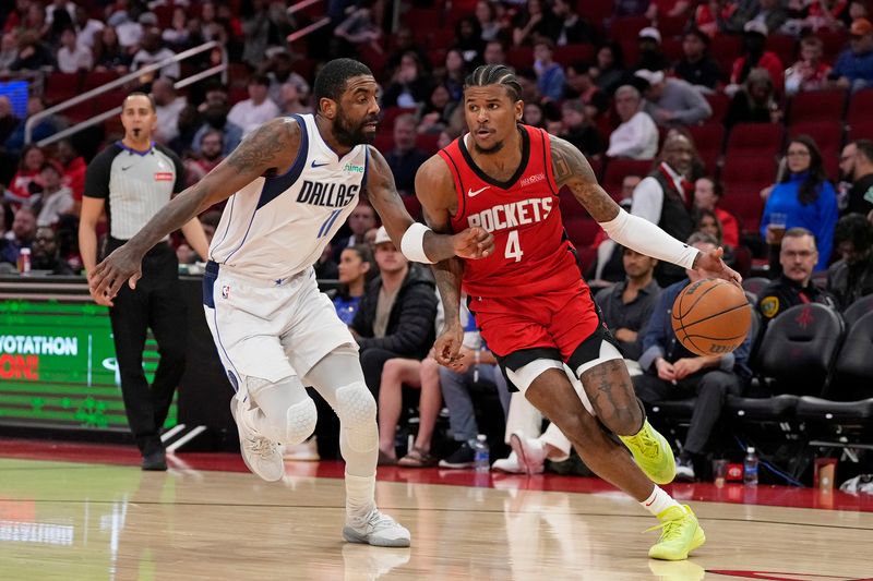 HOUSTON, TX - JANUARY 1:  Jalen Green #4 of the Houston Rockets dribbles the ball during the game against the Dallas Mavericks on January 1, 2025 at the Toyota Center in Houston, Texas. NOTE TO USER: User expressly acknowledges and agrees that, by downloading and or using this photograph, User is consenting to the terms and conditions of the Getty Images License Agreement. Mandatory Copyright Notice: Copyright 2025 NBAE (Photo by Kevin M. Cox/NBAE via Getty Images)