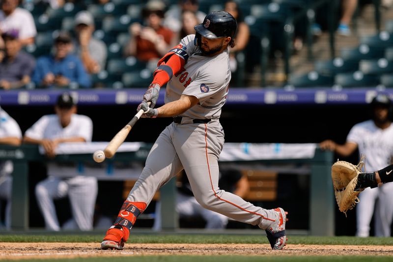 Jul 24, 2024; Denver, Colorado, USA; Boston Red Sox right fielder Wilyer Abreu (52) hits in the eighth inning against the Colorado Rockies at Coors Field. Mandatory Credit: Isaiah J. Downing-USA TODAY Sports