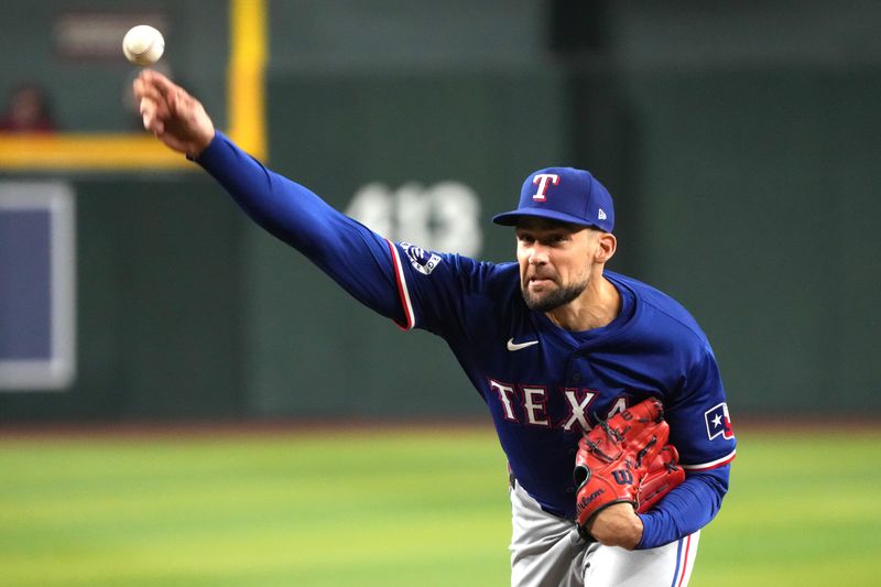 Sep 10, 2024; Phoenix, Arizona, USA; Texas Rangers pitcher Nathan Eovaldi (17) throws against the Arizona Diamondbacks in the first inning at Chase Field. Mandatory Credit: Rick Scuteri-Imagn Images