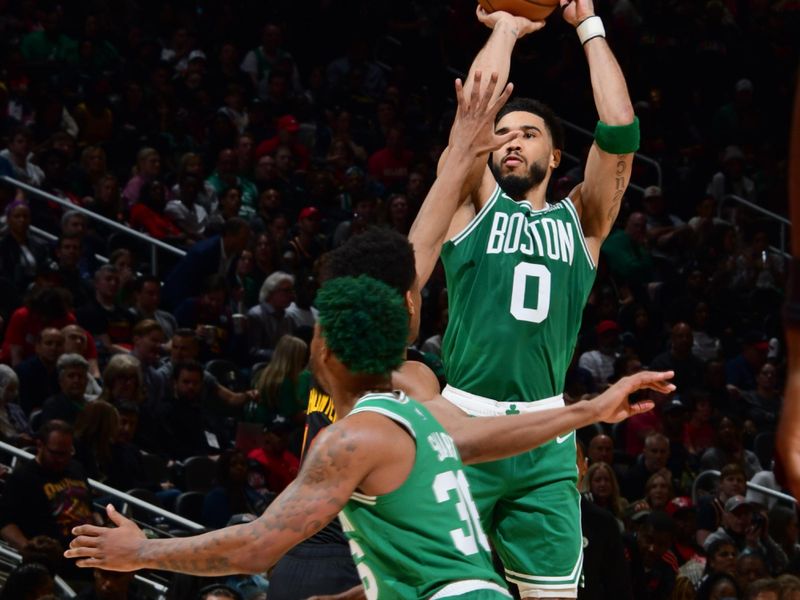 ATLANTA, GA - APRIL 21: Jayson Tatum #0 of the Boston Celtics shoots the ball during Round 1 Game 3 of the 2023 NBA Playoffs on April 21, 2023 at State Farm Arena in Atlanta, Georgia.  NOTE TO USER: User expressly acknowledges and agrees that, by downloading and/or using this Photograph, user is consenting to the terms and conditions of the Getty Images License Agreement. Mandatory Copyright Notice: Copyright 2023 NBAE (Photo by Scott Cunningham/NBAE via Getty Images)