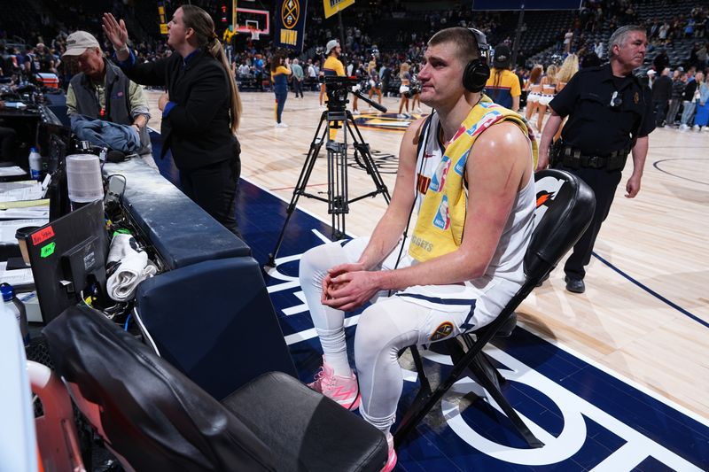 DENVER, CO - MARCH 21: Nikola Jokic #15 of the Denver Nuggets talks to the media after the game against the New York Knicks on March 21, 2024 at the Ball Arena in Denver, Colorado. NOTE TO USER: User expressly acknowledges and agrees that, by downloading and/or using this Photograph, user is consenting to the terms and conditions of the Getty Images License Agreement. Mandatory Copyright Notice: Copyright 2024 NBAE (Photo by Garrett Ellwood/NBAE via Getty Images)