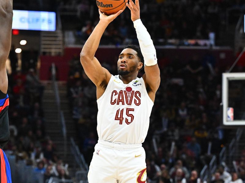 CLEVELAND, OHIO - JANUARY 27: Donovan Mitchell #45 of the Cleveland Cavaliers shoots during the third quarter against the Detroit Pistons at Rocket Mortgage Fieldhouse on January 27, 2025 in Cleveland, Ohio. The Cavaliers defeated the Pistons 110-91. NOTE TO USER: User expressly acknowledges and agrees that, by downloading and or using this photograph, User is consenting to the terms and conditions of the Getty Images License Agreement. (Photo by Jason Miller/Getty Images)