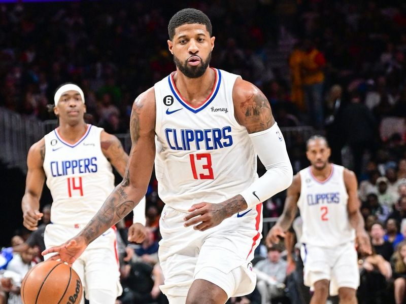 ATLANTA, GA - JANUARY 28: Paul George #13 of the LA Clippers drives to the basket during the game on January 28, 2023 at State Farm Arena in Atlanta, Georgia.  NOTE TO USER: User expressly acknowledges and agrees that, by downloading and/or using this Photograph, user is consenting to the terms and conditions of the Getty Images License Agreement. Mandatory Copyright Notice: Copyright 2023 NBAE (Photo by Adam Hagy/NBAE via Getty Images)