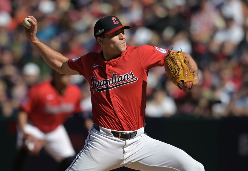 Oct 5, 2024; Cleveland, Ohio, USA; Cleveland Guardians pitcher Cade Smith (36) throws in the fifth inning against the Detroit Tigers in game one of the ALDS for the 2024 MLB Playoffs at Progressive Field. Mandatory Credit: Ken Blaze-Imagn Images