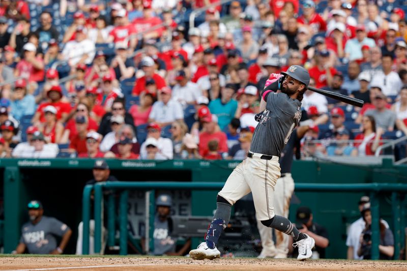 May 25, 2024; Washington, District of Columbia, USA; Washington Nationals outfielder Jesse Winker (6) singles against the Seattle Mariners during the seventh inning at Nationals Park. Mandatory Credit: Geoff Burke-USA TODAY Sports