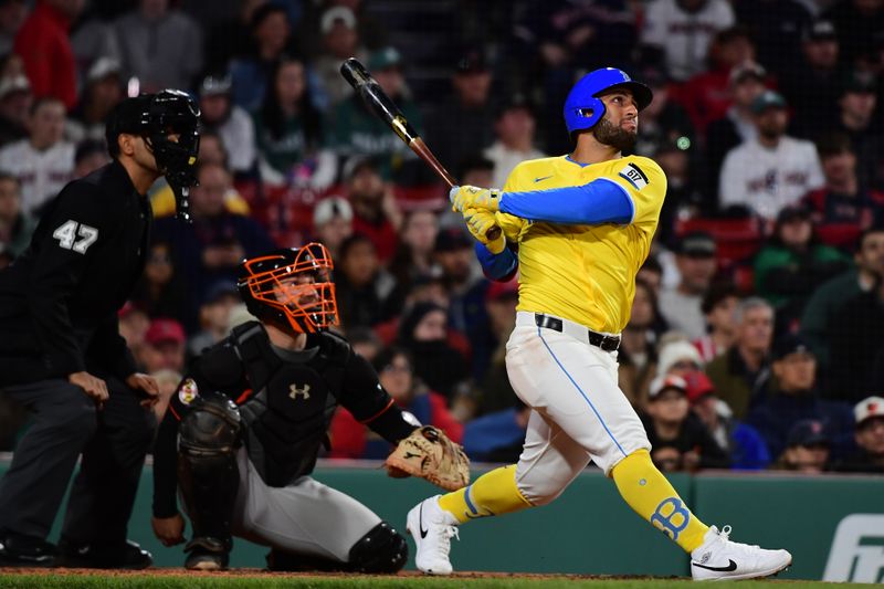 May 24, 2025; Boston, Massachusetts, USA; Boston Red Sox first baseman Abraham Toro (29) hits a home run during the ninth inning against the Baltimore Orioles at Fenway Park. Mandatory Credit: Bob DeChiara-Imagn Images
