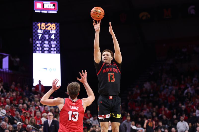 Feb 15, 2026; Piscataway, New Jersey, USA; Maryland Terrapins forward Elijah Saunders (13) shoots the ball against Rutgers Scarlet Knights guard Harun Zrno (13) during the first half at Jersey Mike's Arena. Mandatory Credit: Vincent Carchietta-Imagn Images