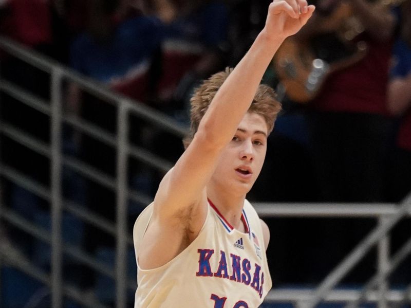 Feb 27, 2024; Lawrence, Kansas, USA; Kansas Jayhawks guard Johnny Furphy (10) celebrates against the Brigham Young Cougars after scoring during the first half at Allen Fieldhouse. Mandatory Credit: Denny Medley-USA TODAY Sports