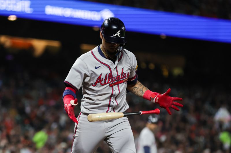 Aug 12, 2024; San Francisco, California, USA; Atlanta Braves shortstop Orlando Arcia (11) reacts after striking out during the seventh inning against the San Francisco Giants at Oracle Park. Mandatory Credit: Sergio Estrada-USA TODAY Sports