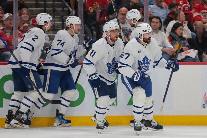 May 16, 2025; Sunrise, Florida, USA; Toronto Maple Leafs left wing Max Pacioretty (67) celebrates with teammates after scoring against the Florida Panthers during the third period in game six of the second round of the 2025 Stanley Cup Playoffs at Amerant Bank Arena. Mandatory Credit: Sam Navarro-Imagn Images