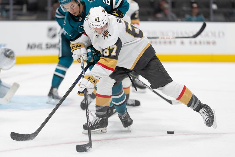 Sep 24, 2023; San Jose, California, USA;  Vegas Golden Knights forward Tyler Benson (67) attempts to gain control of the puck during the third period against the San Jose Sharks at SAP Center at San Jose. Mandatory Credit: Stan Szeto-USA TODAY Sports