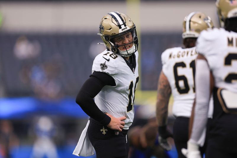 New Orleans Saints quarterback Spencer Rattler (18) warms up before an NFL football game against the Los Angeles Chargers in Inglewood, Calif., Sunday, Oct. 27, 2024. (AP Photo/Ryan Sun)