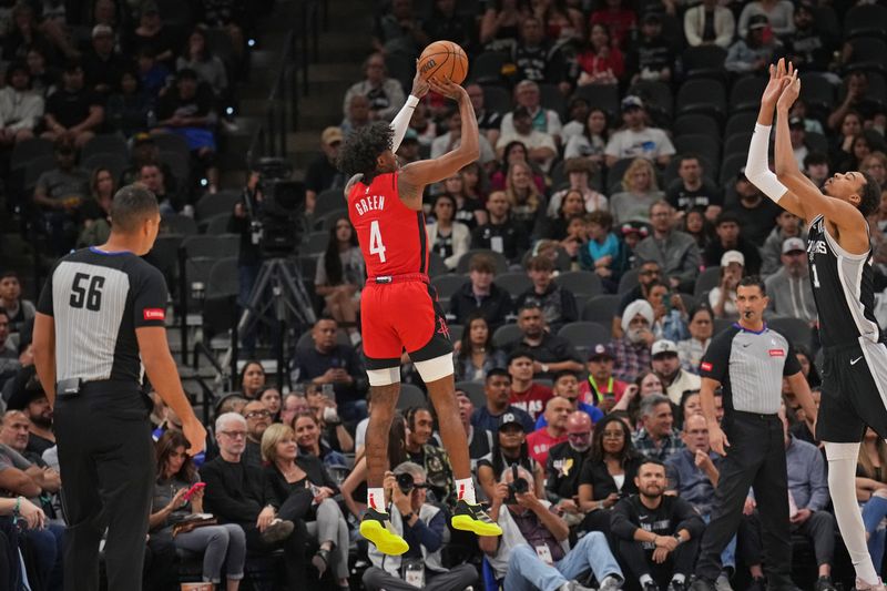 SAN ANTONIO, TX - MARCH 12: Jalen Green #4 of the Houston Rockets shoots the ball during the game against the San Antonio Spurs on March 12, 2024 at the Frost Bank Center in San Antonio, Texas. NOTE TO USER: User expressly acknowledges and agrees that, by downloading and or using this photograph, user is consenting to the terms and conditions of the Getty Images License Agreement. Mandatory Copyright Notice: Copyright 2024 NBAE (Photos by Jesse D. Garrabrant/NBAE via Getty Images)