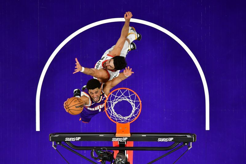 PHOENIX, AZ - NOVEMBER 2: Devin Booker #1 of the Phoenix Suns drives to the basket during the game against the Portland Trail Blazers on November 2, 2024 at Footprint Center in Phoenix, Arizona. NOTE TO USER: User expressly acknowledges and agrees that, by downloading and or using this photograph, user is consenting to the terms and conditions of the Getty Images License Agreement. Mandatory Copyright Notice: Copyright 2024 NBAE (Photo by Kate Frese/NBAE via Getty Images)