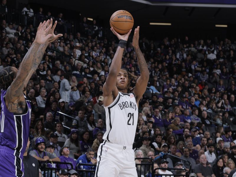 SACRAMENTO, CA - NOVEMBER 24: Noah Clowney #21 of the Brooklyn Nets  shoots the ball during the game against the Sacramento Kings on November 24, 2024 at Golden 1 Center in Sacramento, California. NOTE TO USER: User expressly acknowledges and agrees that, by downloading and or using this Photograph, user is consenting to the terms and conditions of the Getty Images License Agreement. Mandatory Copyright Notice: Copyright 2024 NBAE (Photo by Rocky Widner/NBAE via Getty Images)