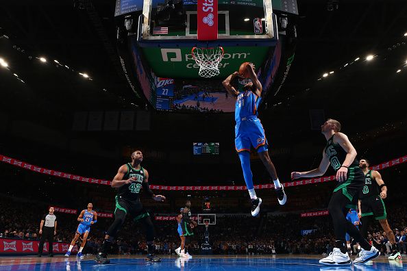 OKLAHOMA CITY, OK - JANUARY 2: Isaiah Joe #11 of the Oklahoma City Thunder dunks the ball during the game against the Boston Celtics on January 2, 2024 at Paycom Arena in Oklahoma City, Oklahoma. NOTE TO USER: User expressly acknowledges and agrees that, by downloading and or using this photograph, User is consenting to the terms and conditions of the Getty Images License Agreement. Mandatory Copyright Notice: Copyright 2024 NBAE (Photo by Zach Beeker/NBAE via Getty Images)