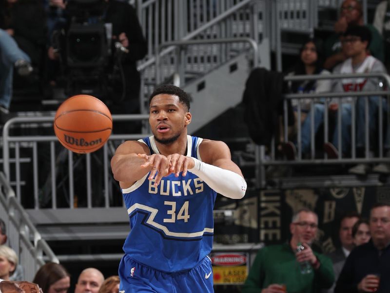 MILWAUKEE, WI - FEBRUARY 23: Giannis Antetokounmpo #34 of the Milwaukee Bucks passes the ball during the game against the Miami Heat   on February 23, 2025 at Fiserv Forum Center in Milwaukee, Wisconsin. NOTE TO USER: User expressly acknowledges and agrees that, by downloading and or using this Photograph, user is consenting to the terms and conditions of the Getty Images License Agreement. Mandatory Copyright Notice: Copyright 2025 NBAE (Photo by Gary Dineen/NBAE via Getty Images).
