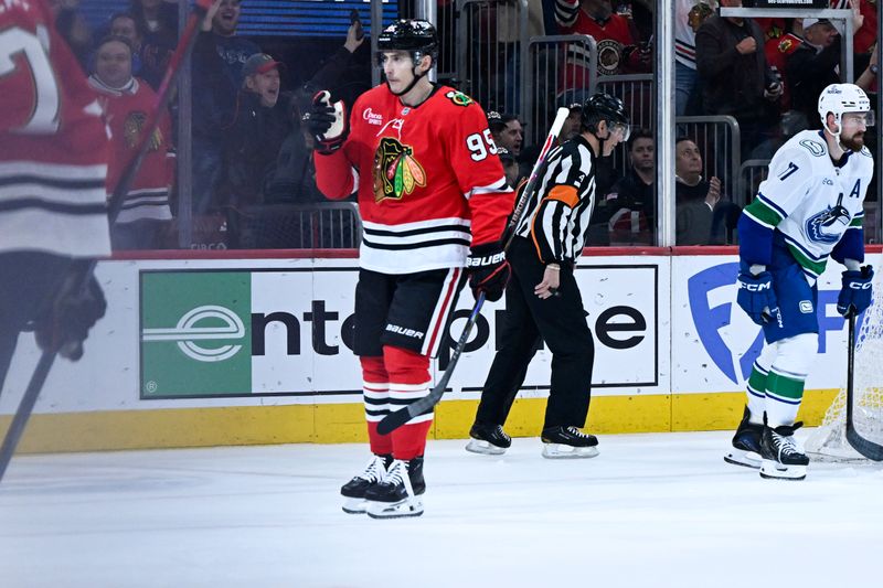 Mar 6, 2026; Chicago, Illinois, USA;  Chicago Blackhawks right wing Ilya Mikheyev (95) celebrates his goal against the Vancouver Canucks during the first period at United Center. Mandatory Credit: Matt Marton-Imagn Images
