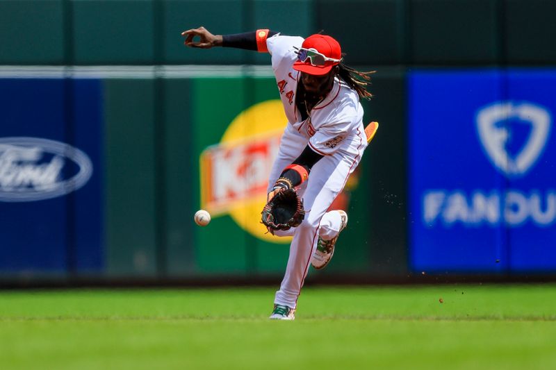 Aug 18, 2024; Cincinnati, Ohio, USA; Cincinnati Reds shortstop Elly De La Cruz (44) grounds the ball hit by Kansas City Royals third baseman Maikel Garcia (not pictured) in the first inning at Great American Ball Park. Mandatory Credit: Katie Stratman-USA TODAY Sports