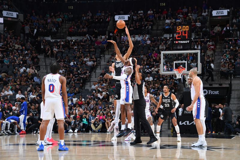 SAN ANTONIO, TX - APRIL 7: Victor Wembanyama #1 of the San Antonio Spurs and Paul Reed #44 of the Philadelphia 76ers go up for a jump ball on April 7, 2024 at the Frost Bank Center in San Antonio, Texas. NOTE TO USER: User expressly acknowledges and agrees that, by downloading and or using this photograph, user is consenting to the terms and conditions of the Getty Images License Agreement. Mandatory Copyright Notice: Copyright 2024 NBAE (Photos by Michael Gonzales/NBAE via Getty Images)